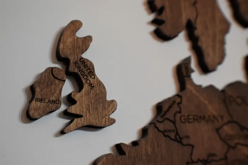 Wooden cut-out map pieces of the United Kingdom, Ireland and Germany